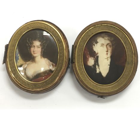 A quality early 19th Century hand painted portrait miniature of a lady and one other conforming of a gentleman, on ivory, (on