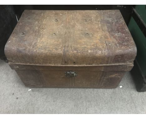 Tin trunk with various contents. Size approx 66x45x42cm