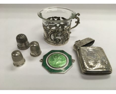 A silver and glass cup, a vesta case, three thimbles together with a silver and enamel pendant. NO RESERVE.
