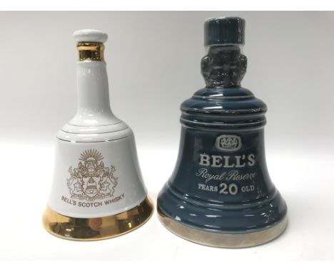 A pair of Bell's Scotch whiskey bottles. NO RESERVE.