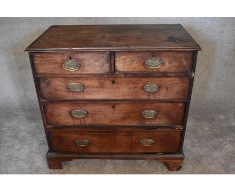 A Georgian mahogany chest of two short over three long drawers on bracket feet. H.90 x 95cm 