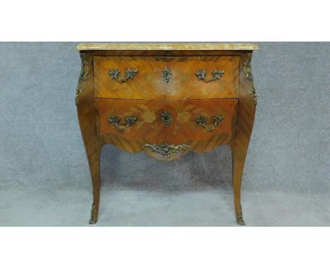 A Louis XV style kingwood marquetry floral and foliate inlaid commode with moulded marble top above two drawers, ormolu mount