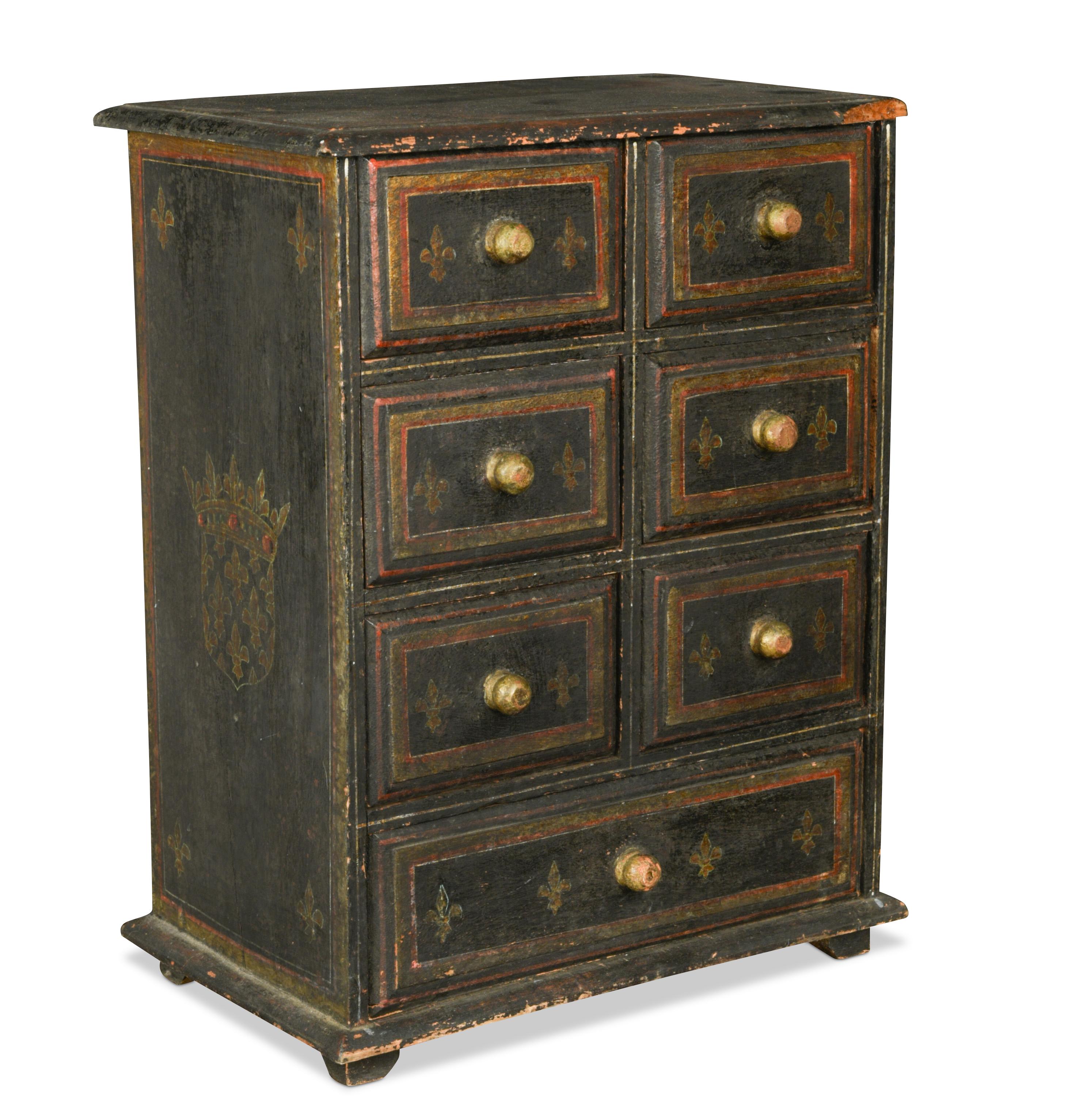 A miniature painted chest of drawers, with six short and ...