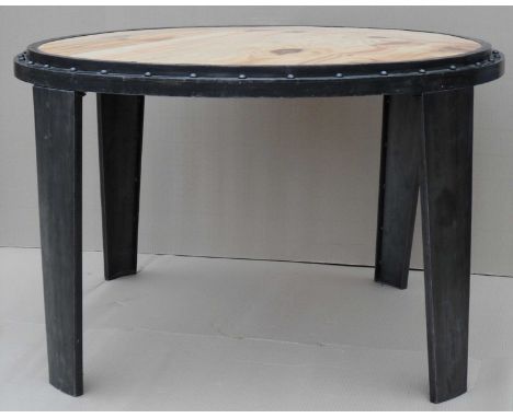 Studded iron and wood round table with light top, 77x121x121cm. 