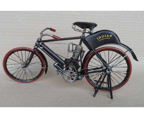 A group of eight scale model steel Springfield motorbikes, 16x9x31cm. (8)