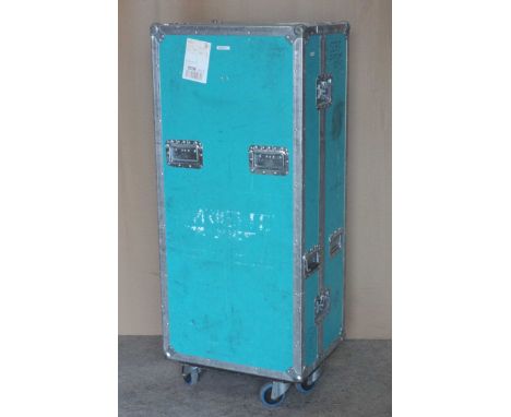 Tall turquoise wheeled packing trunk.  (2)