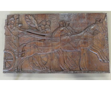 A decorative carved wooden panel, 75x126x6cm.
