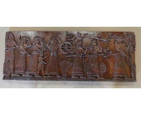 A decorative carved wooden panel, 75x191x6cm.