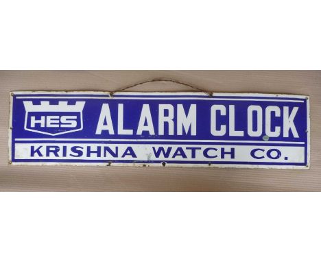 Hes alarm clock sign. 