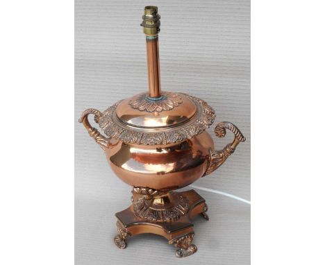 Copper urn lamp.