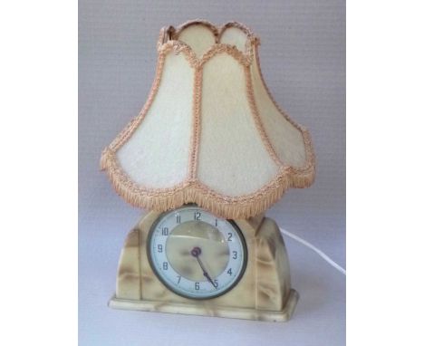 Clock/lamp combined.