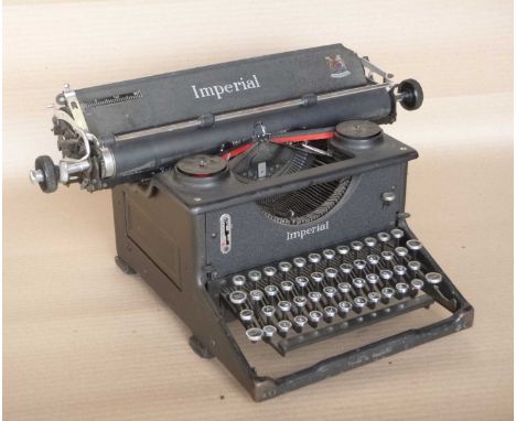 Large black imperial typewriter.