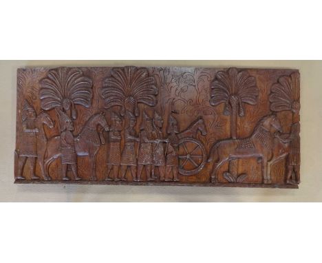 A decorative carved wooden panel, 75x177x6cm.