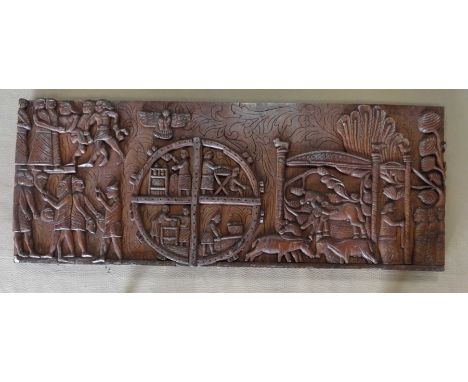 A decorative carved wooden panel, 75x191x6cm.