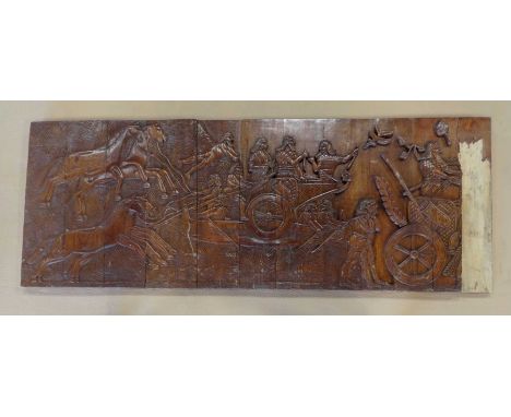 A decorative carved wooden panel, 75x198x6cm.