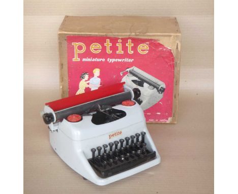 Typewriter with box, 'Petite' toy.