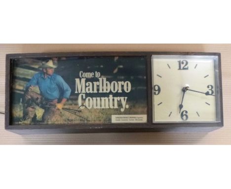 An advertising 'Marlboro' county light up display and clock, 25x65x12cm.