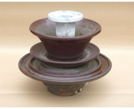 Brown ceramic isolators. (6)