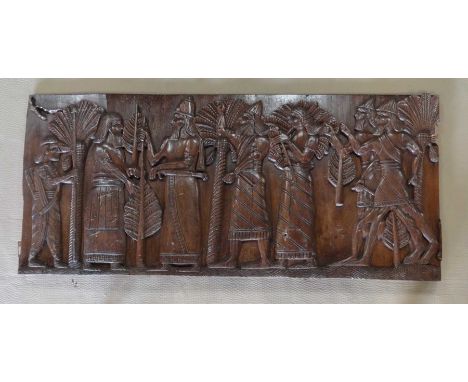 A decorative carved wooden panel, 75x166x6cm.