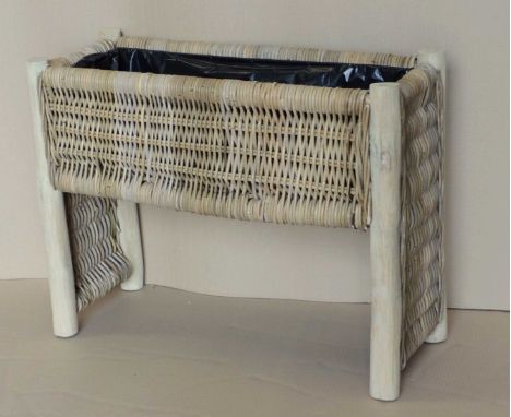 Large wicker planter with bamboo legs, 70x119x39cm. (5)