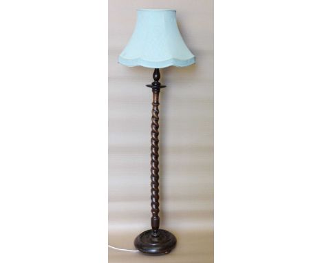 Standard lamp with shade.