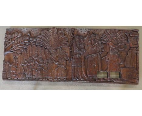 A decorative carved wooden panel, 75x183x6cm.