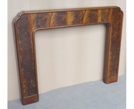 Mahogany veneered fire surround.