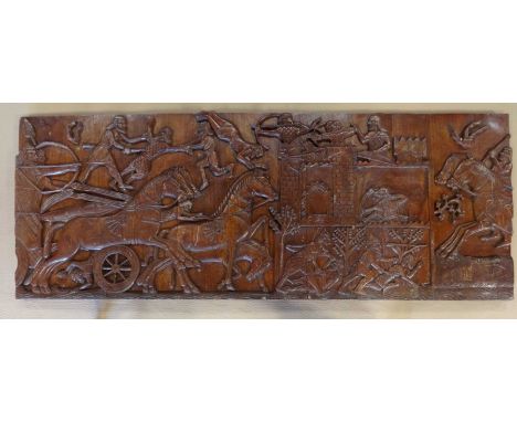 A decorative carved wooden panel, 75x198x6cm.