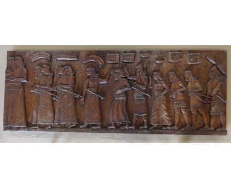 A decorative carved wooden panel, 75x198x6cm.