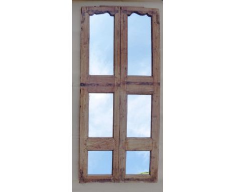 A door panel with six mirrored sections, 187x85x4cm.