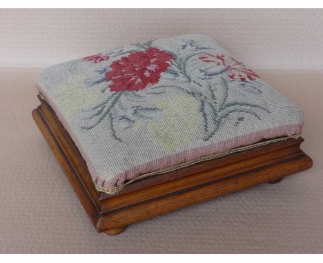 Small footstool wtih tapestry.