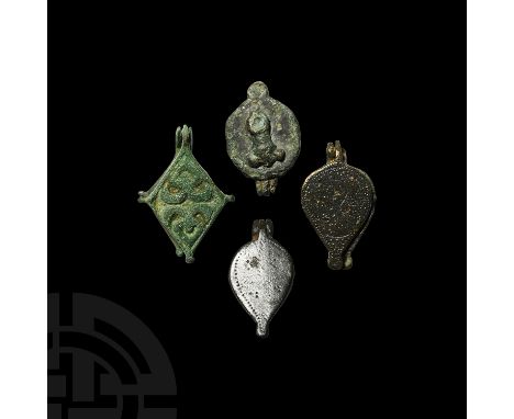 2nd-3rd century AD. A group of four seal boxes comprising: one lozengiform with knops to corners, small suspension loop on on