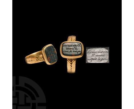 17th-19th century AD. A gold posy seal ring with D-section hoop engraved with a medial band of geometric motifs, expanding at