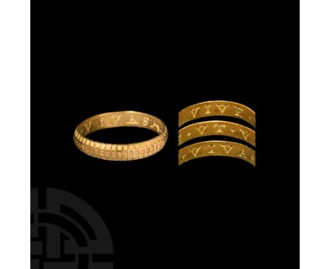 16th-early 17th century AD. A gold D-section annular band bearing three circumferential rows of shallow square cells on the e