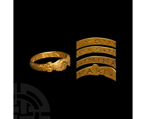 16th-early 17th century AD. A gold annular D-section fede band with bezel formed as two hands engaged in a handshake, emergin