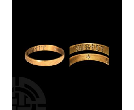 14th-15th century AD. A gold D-section annular band with plain external face, the internal face with Anglo-French inscription