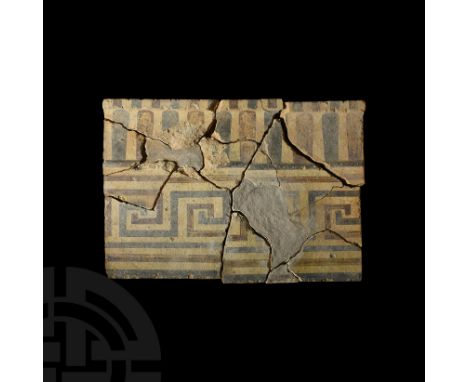6th century BC. An Etruscan terracotta pediment, sima, comprising two bands of decorated patterns; the horizontal band with r