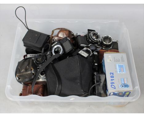 A Box Containing Various Vintage Camera Bodies, Cases and Other Photographic Equipment 