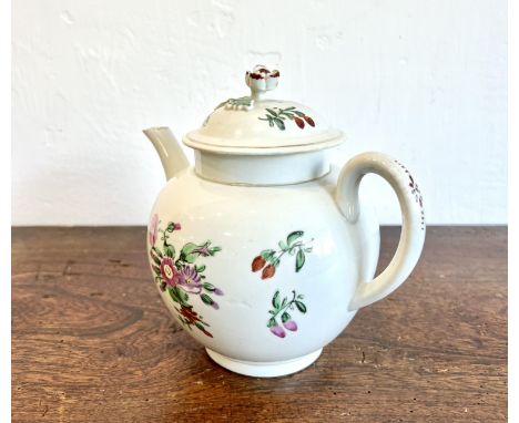 A Worcester porcelain first period teapot - c.1770, globular form with C-scroll handle and moulded flower finial to the domed
