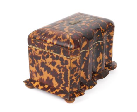 A George III tortoiseshell tea caddy - domed rectangular form with inverted arcading to the front and a shaped, outset base w