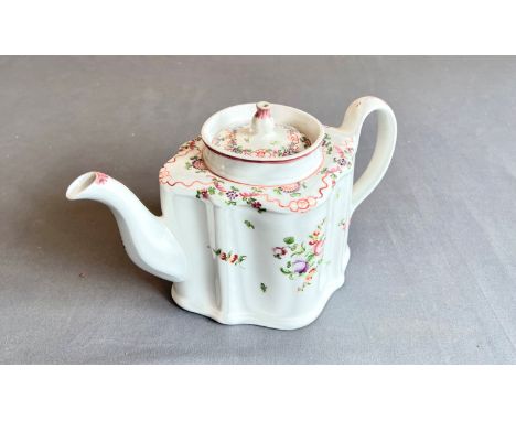 A New Hall porcelain 'Knitting Wool' pattern silver shape teapot - early 19th century, painted with floral sprays and an iron