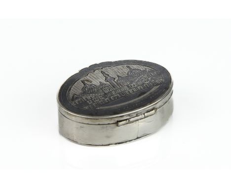 A silver niello work snuff box, probably Russian - oval with scalloped thumbpiece, late 19th century, apparently unmarked, th