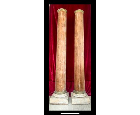 A fine pair of Georgian pine architectural columns - of slightly tapered form, with gilt painted capitals and base and a pain