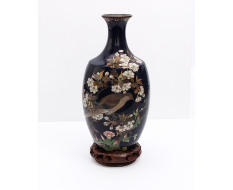 A Japanese cloisonné vase - Meiji period (1869-1912), of shouldered baluster form, decorated with a pheasant perched in the b