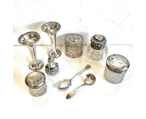 A small group of silver items - including a pair of George V silver stem vases, weighted, Horace Woodward &amp; Co. Ltd., Lon