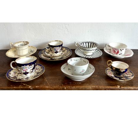 A collection of 18th and 19th century teacups, tea bowls and coffee cans - including seventeen cups and saucers; a tea bowl a