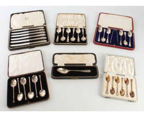 Four cased sets of silver tea and coffee spoons - first half 20th century, one set with a pair of sugar tongs, one set of Alb