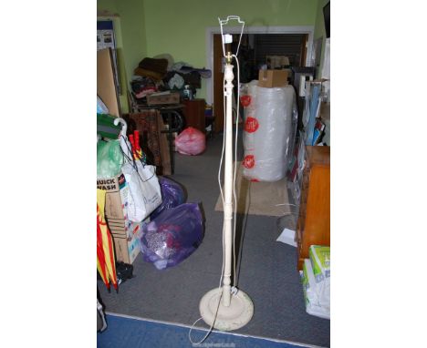 A painted standard lamp.