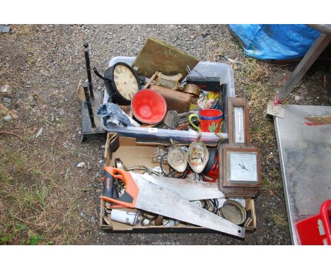 Two boxes of hand saws, lead light and miscellanea.