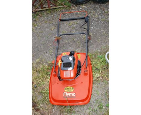 A Flymo Domestic L400 mower, engine had good compression at time of lotting.